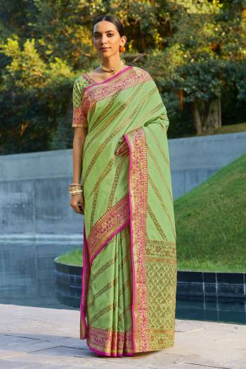 Garb This Designer Partywear Saree Are Fine Saree Paired With Blouse.This Saree And Blouse Are Silk Based Fabric With Wevon Designer Work. Buy This Pretty Saree Now.