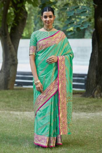 Garb This Designer Partywear Saree Are Fine Saree Paired With Blouse.This Saree And Blouse Are Silk Based Fabric With Wevon Designer Work. Buy This Pretty Saree Now.