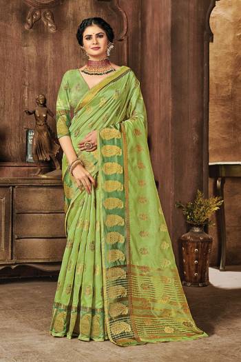 Garb This Designer Saree Are Fine Color Paired With Blouse.This Saree And Blouse Are Organza Based Fabric With Wevon Designer Work. Buy This Pretty Saree Now.