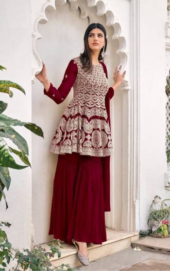 Attrective This Designer Sharara Suit In Lovely Color.Its Pretty Heavy Designer Embroidery Work Top Is Viscose Georgette Based Paired With Viscose Georgette Bottom And Soft Net Fabricated Dupatta Which Gives An Attractive To The Suit.