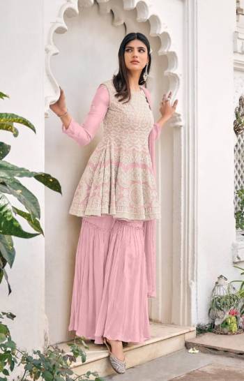 Attrective This Designer Sharara Suit In Lovely Color.Its Pretty Heavy Designer Embroidery Work Top Is Viscose Georgette Based Paired With Viscose Georgette Bottom And Soft Net Fabricated Dupatta Which Gives An Attractive To The Suit.