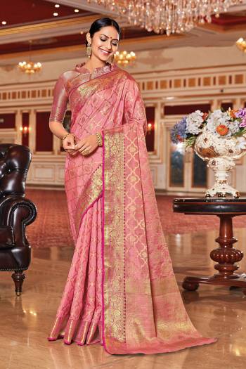 Garb This Designer Traditional Saree Are Fine Color Paired With Blouse.This Saree And Blouse Are Silk Based Fabric With Wevon Designer Work. Buy This Pretty Saree Now.