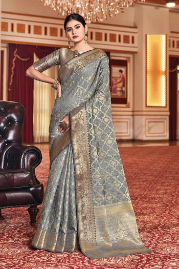 Garb This Designer Traditional Saree Are Fine Color Paired With Blouse.This Saree And Blouse Are Silk Based Fabric With Wevon Designer Work. Buy This Pretty Saree Now.