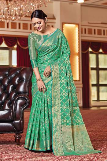 Garb This Designer Traditional Saree Are Fine Color Paired With Blouse.This Saree And Blouse Are Silk Based Fabric With Wevon Designer Work. Buy This Pretty Saree Now.