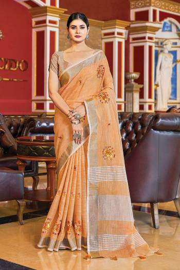 Looking Traditional This Partywear Saree Are Fine Color Paired With Blouse.This Saree And Blouse Are Linen Based Fabric With Wevon Designer With Mirror Embroidery Work. Buy This Pretty Saree Now.