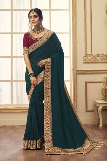 Stylist This Partywear Designer Fine Colour Saree Paired With Blouse.This Saree Are Vichitra Silk And Blouse Are Phantom Silk Fabric With Heavy Jacquad Border With Embroidery,Stone Work Blouse. Buy This Pretty Saree Now.