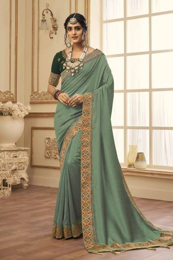 Stylist This Partywear Designer Fine Colour Saree Paired With Blouse.This Saree Are Vichitra Silk And Blouse Are Phantom Silk Fabric With Heavy Jacquad Border With Embroidery,Stone Work Blouse. Buy This Pretty Saree Now.