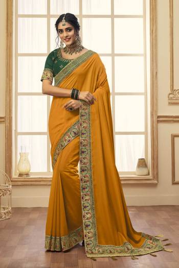 Stylist This Partywear Designer Fine Colour Saree Paired With Blouse.This Saree Are Vichitra Silk And Blouse Are Phantom Silk Fabric With Heavy Jacquad Border With Embroidery,Stone Work Blouse. Buy This Pretty Saree Now.