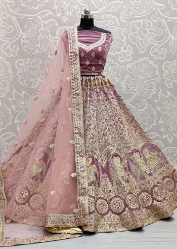 Stylist This Wedding Partywear Heavy Designer Lehenga Choli And Dupatta In Fine Color Fabricated On Velvet Beautified With Heavy Attractive Designer Embroidery And Diamond Work. Buy Now.