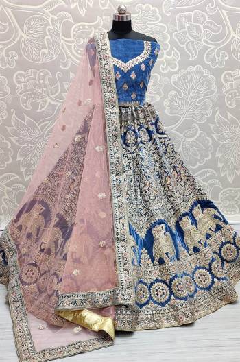 Stylist This Wedding Partywear Heavy Designer Lehenga Choli And Dupatta In Fine Color Fabricated On Velvet Beautified With Heavy Attractive Designer Embroidery And Diamond Work. Buy Now.