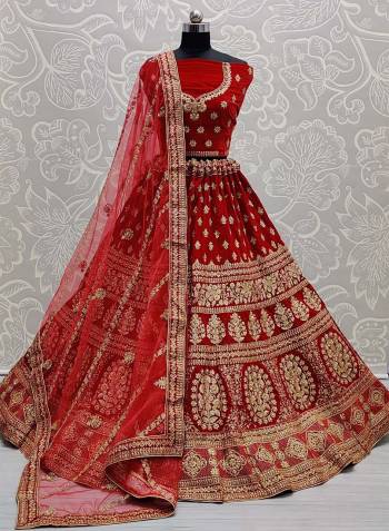 Attrective This Wedding Partywear Heavy Designer Lehenga Choli And Dupatta In Fine Color Fabricated On Velvet Beautified With Heavy Attractive Designer Embroidery And Zarkan Diamond Work. 