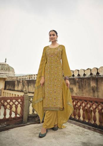 Attrective Look This Designer Long Length Suit In Lovely Color.Its Pretty Heavy Designer Wevon Minakari Work Top Is Silk Jacquard Based Paired With Santoon Bottom And Silk Fabricated Dupatta Which Gives An Attractive To The Suit.