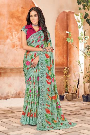 Garb This Designer Saree Are Fine Color Paired With Contrasted Blouse.This Saree And Blouse Are Georgette Based Fabric With Printed Designer. Buy This Pretty Saree Now.