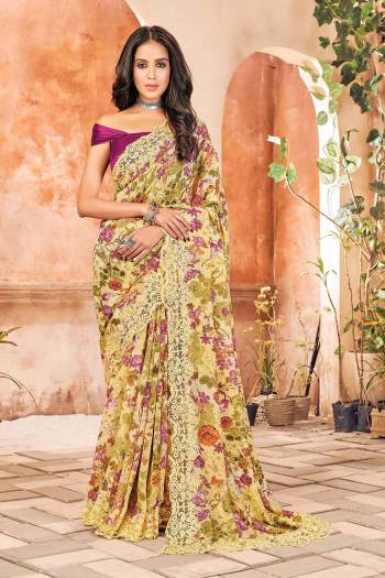 Garb This Designer Saree Are Fine Color Paired With Contrasted Blouse.This Saree And Blouse Are Georgette Based Fabric With Printed Designer. Buy This Pretty Saree Now.
