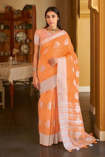 This Designer Partywear Saree Are Fine Saree Paired With Blouse.This Saree And Blouse Are Linen Based Fabric With Wevon Designer Work. Buy This Pretty Saree Now.