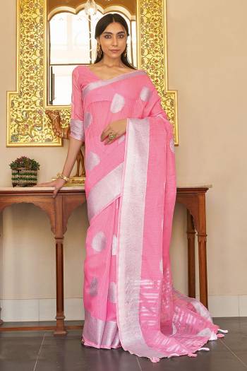 This Designer Partywear Saree Are Fine Saree Paired With Blouse.This Saree And Blouse Are Linen Based Fabric With Wevon Designer Work. Buy This Pretty Saree Now.