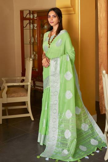 This Designer Partywear Saree Are Fine Saree Paired With Blouse.This Saree And Blouse Are Linen Based Fabric With Wevon Designer Work. Buy This Pretty Saree Now.