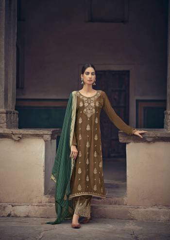 Attrective This Designer Long Length Suit In Lovely Light Color.Its Pretty Heavy Designer Wevon Work Top Is Silk Jacquard Based Paired With Santoon Bottom Work And Organza Fabricated Wevon Dupatta Which Gives An Attractive To The Suit.