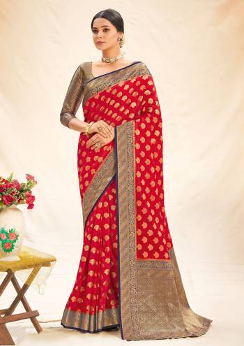 Garb This Designer Partywear Saree Are Fine Saree Paired With Blouse.This Saree And Blouse Are Silk Based Fabric With Wevon Designer Work. Buy This Pretty Saree Now.