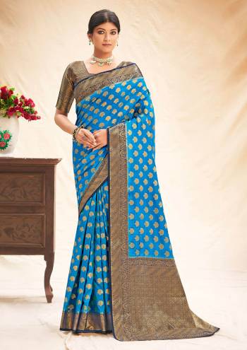Garb This Designer Partywear Saree Are Fine Saree Paired With Blouse.This Saree And Blouse Are Silk Based Fabric With Wevon Designer Work. Buy This Pretty Saree Now.