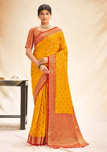 Garb This Designer Partywear Saree Are Fine Saree Paired With Blouse.This Saree And Blouse Are Silk Based Fabric With Wevon Designer Work. Buy This Pretty Saree Now.
