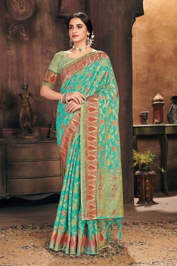 Attrective This Partywear Saree Paired With Blouse.This Saree And Blouse Are Organza Based Fabric With Wevon Designer Work. Buy This Pretty Saree Now.