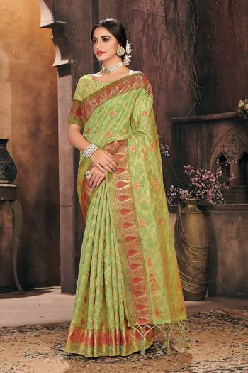 Attrective This Partywear Saree Paired With Blouse.This Saree And Blouse Are Organza Based Fabric With Wevon Designer Work. Buy This Pretty Saree Now.