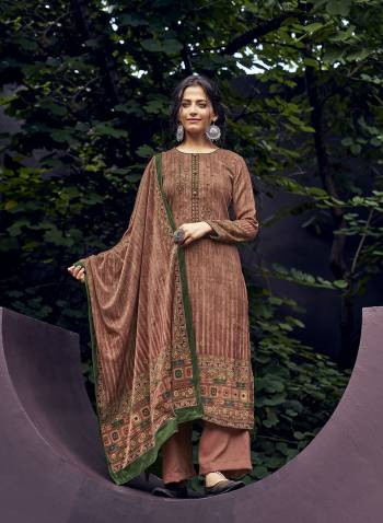 Attrective This Designer Long Length Winter Wear Suit In Lovely Dusty Color.Its Pretty Designer Digital Printed With Embroidery And Diamond Work Top Is Pashmina Based Paired With Pashmina Bottom And Velvet Fabricated Dupatta Which Gives An Attractive To The Suit.