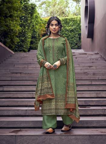 Attrective This Designer Long Length Winter Wear Suit In Lovely Dusty Color.Its Pretty Designer Digital Printed With Embroidery And Diamond Work Top Is Pashmina Based Paired With Pashmina Bottom And Velvet Fabricated Dupatta Which Gives An Attractive To The Suit.