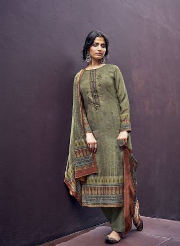 Attrective This Designer Long Length Winter Wear Suit In Lovely Dusty Color.Its Pretty Designer Digital Printed With Embroidery And Diamond Work Top Is Pashmina Based Paired With Pashmina Bottom And Velvet Fabricated Dupatta Which Gives An Attractive To The Suit.