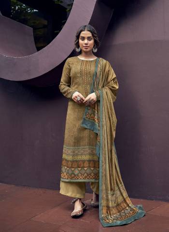 Attrective This Designer Long Length Winter Wear Suit In Lovely Dusty Color.Its Pretty Designer Digital Printed With Embroidery And Diamond Work Top Is Pashmina Based Paired With Pashmina Bottom And Velvet Fabricated Dupatta Which Gives An Attractive To The Suit.