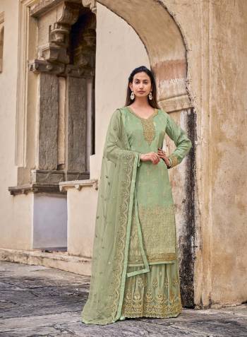 Looking This Designer Plazzo Suits In Lovely Color.Its Pretty Designer Wevon With Embroidery And Stone Work Top Is Dola Jacquard Based Paired Bottom Net With Net Fabricated Dupatta Which Gives An Attractive To The Dress.