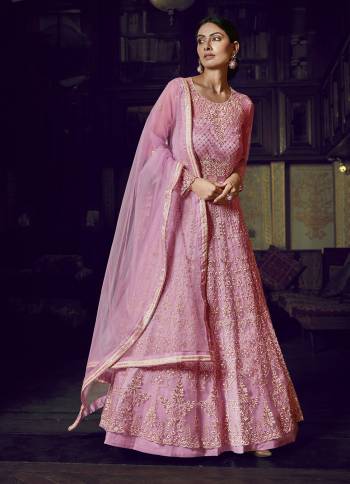 Look Pretty In This Beautiful Designer Floor Length Gown In Pink Color Paired With Pink Colored Dupatta. This Semi-Stitched Gown And Dupatta Are Fabricated On Net Beautified With Pretty Embroidery. Buy Now.