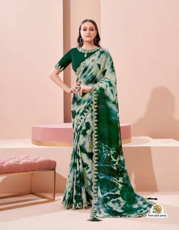 Garb This Partywear Stylist Designer Fine Colour Saree Paired With Blouse.This Saree Are Georgette And Blouse Are Raw Silk Fabric With Heavy Designer Embroidery Work. Buy This Pretty Saree Now.
