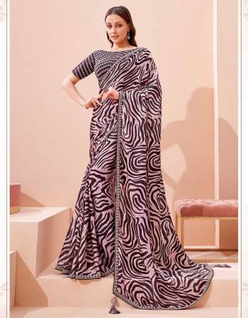 Garb This Partywear Stylist Designer Fine Colour Saree Paired With Blouse.This Saree Are Georgette And Blouse Are Raw Silk Fabric With Heavy Designer Embroidery Work. Buy This Pretty Saree Now.