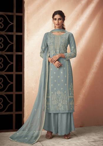 Fine Looking This Designer Long Length Suit In Lovely Color.Its Pretty Designer Lakhnavi Embroidery Work Top Is Muslin Based Paired With Santoon Bottom And Chiffon Fabricated Embroidery Dupatta Which Gives An Attractive To The Suit.