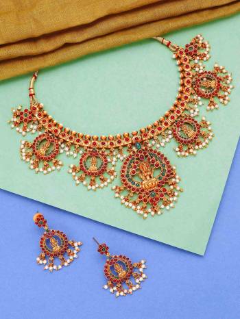 Attrective Traditional Looking To Your Personality By Pairing Up This Beautiful Nacklace With Your Ethnic Attire. This Pretty Set Is In Gold Color Beautified With Temple Work. Buy Now.