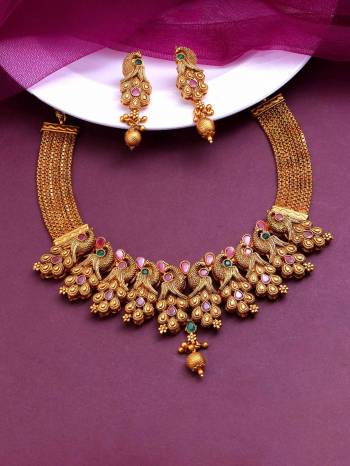 Attrective Traditional Looking To Your Personality By Pairing Up This Beautiful Nacklace With Your Ethnic Attire. This Pretty Set Is In Gold Color Beautified With Temple Work. Buy Now.