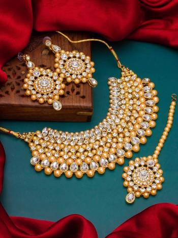 Looking To Your Personality By Pairing Up This Beautiful Nacklace With Your Ethnic Attire. This Pretty Set Is In Gold Color Beautified With Kundan Work. Buy Now.