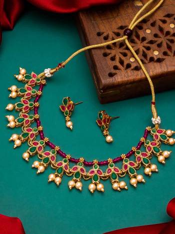 Looking To Your Personality By Pairing Up This Beautiful Nacklace With Your Ethnic Attire. This Pretty Set Is In Multi Color Beautified With Kundan Work. Buy Now.