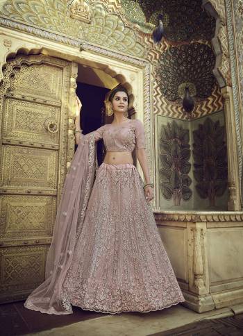 Garb This Partywear Heavy Designer Lehenga Choli In Fine Light Color Fabricated On Soft Net Beautified Fabric With Heavy Designer Sequance,Thread,Jari,Dori Embroidery Work.Buy Now. 