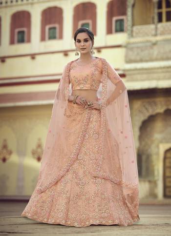 Garb This Partywear Heavy Designer Lehenga Choli In Fine Light Color Fabricated On Soft Net Beautified Fabric With Heavy Designer Sequance,Thread,Jari,Dori Embroidery Work.Buy Now. 