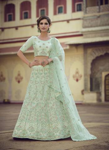 Garb This Partywear Heavy Designer Lehenga Choli In Fine Light Color Fabricated On Soft Net Beautified Fabric With Heavy Designer Sequance,Thread,Jari,Dori Embroidery Work.Buy Now. 