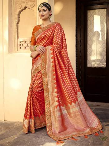 Garb This Partywear Stylist Designer Fine Colour Saree Paired With Blouse.This Wevon Designer With Embroidery Border Saree Are Silk And Blouse Are Raw Silk Fabric With Designer Embroidery Work. Buy This Pretty Saree Now.