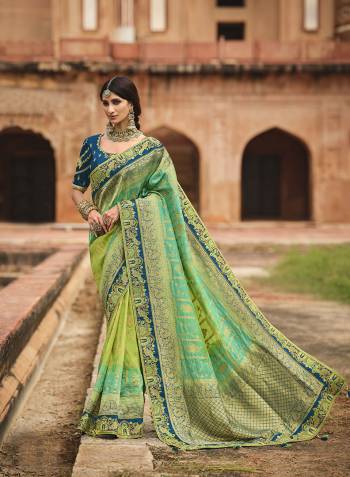 Attrective Looking This Partywear Saree Are Fine Color Paired With Contrasted Blouse.This Saree Are Dola Silk And Blouse Are Banglori Silk Fabric With Heavy Designer Weaving With Border And Blouse Embroidery With Khatli Work. Buy This Pretty Saree Now.