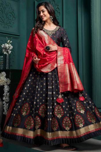 Flaunt Your Rich And Elegant Taste Wearing This Designer Readymade Long Gown With Dupatta In Black Color. This  Pretty Gown Is Fabricated On Tussar Silk And Dupatta Are Tussar Silk Beautified With Heavy Weaving Designer Work. Its Fabric Is Soft Towards Skin And Easy To Carry All Day Long. 