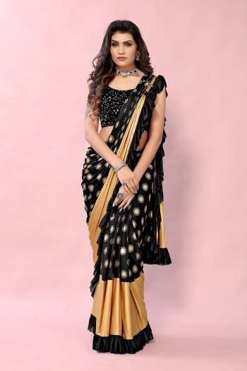 Black and Golden Colored Foil Printed Fancy Saree with Sequins Blouse Buy This Pretty Saree Now