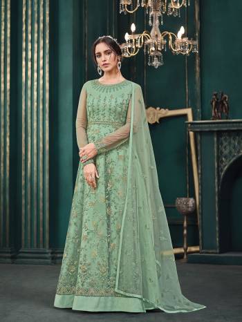 Attrective This Designer Long Length Suit In Lovely Color.Its Pretty Heavy Designer Thread,Sequance Embroidery Work Top Is Butterfly Net Based Paired With Satin Bottom And Butterfly Net Fabricated Dupatta Which Gives An Attractive To The Suit.