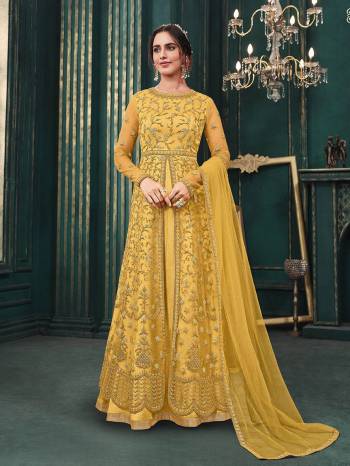 Attrective This Designer Long Length Suit In Lovely Color.Its Pretty Heavy Designer Thread,Sequance Embroidery Work Top Is Butterfly Net Based Paired With Satin Bottom And Butterfly Net Fabricated Dupatta Which Gives An Attractive To The Suit.