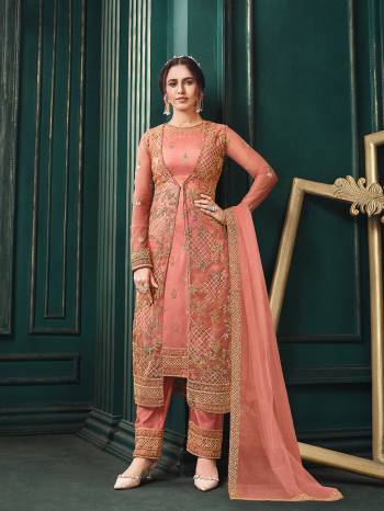 Attrective This Designer Long Length Suit In Lovely Color.Its Pretty Heavy Designer Thread,Sequance Embroidery Work Top Is Butterfly Net Based Paired With Satin Bottom And Butterfly Net Fabricated Dupatta Which Gives An Attractive To The Suit.